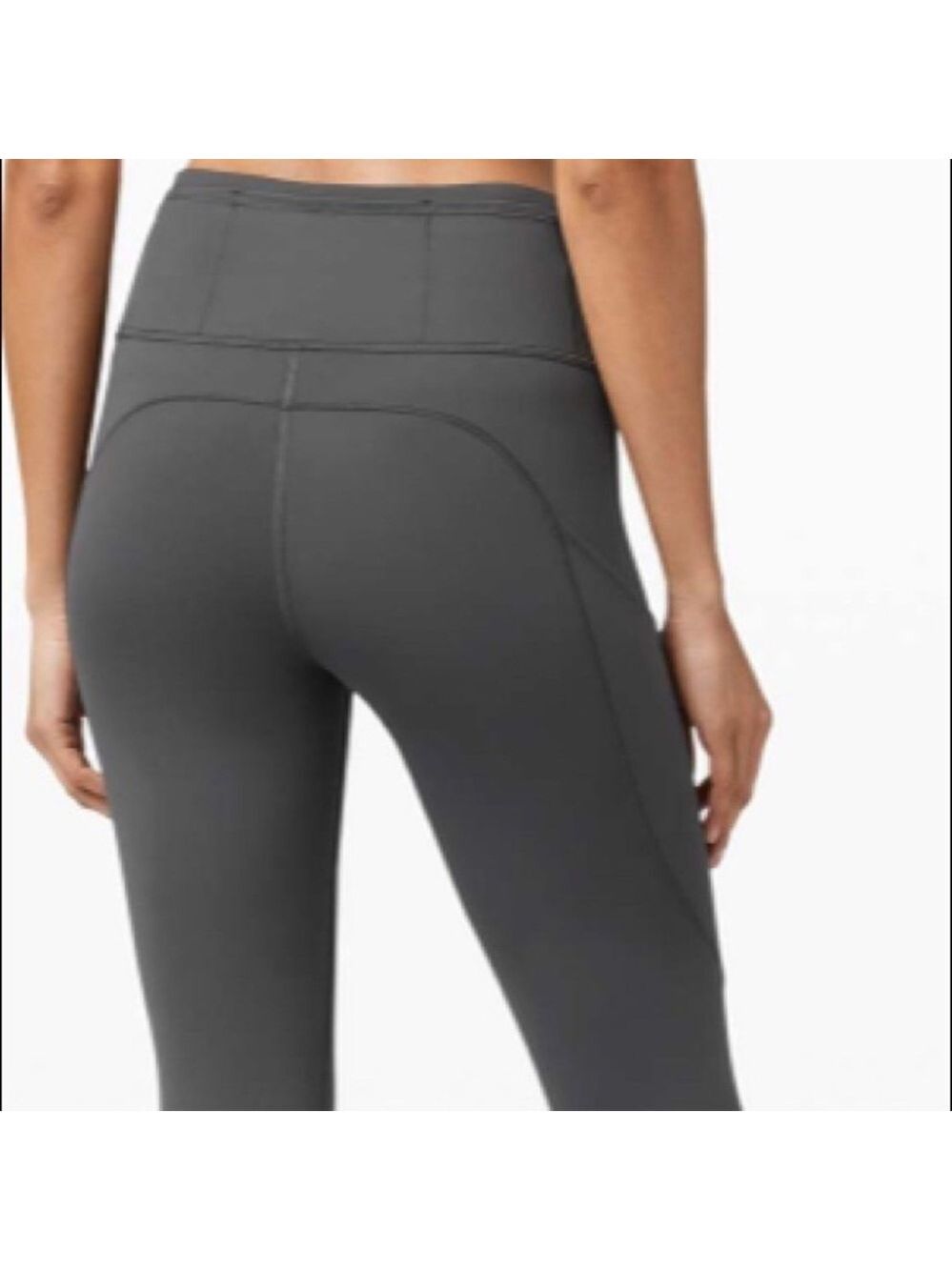 Lululemon leggings. Run Nulux in grey, black/white waist. 7/8 length.